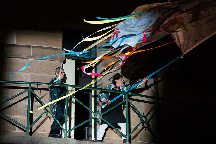 Nancy Mauro-Flude waving the sheet as a flag